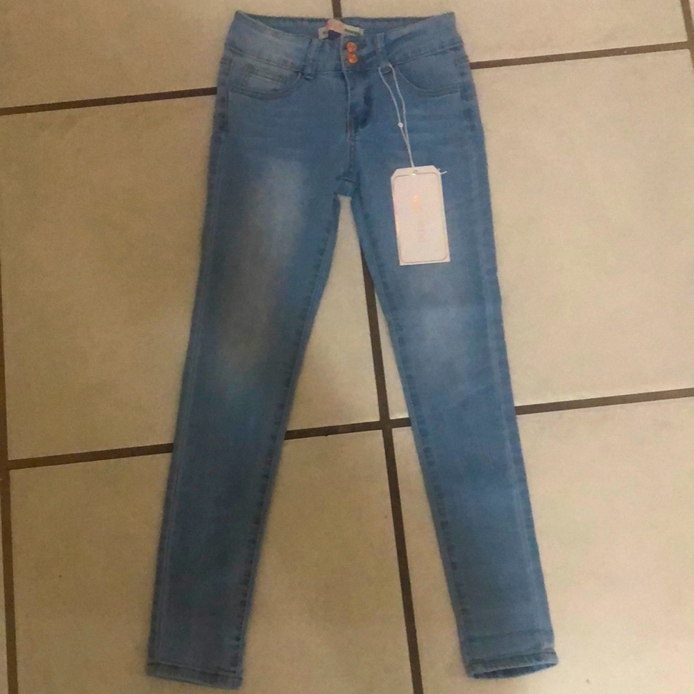 Little girl size 12 light blue Jean brand new with tag on